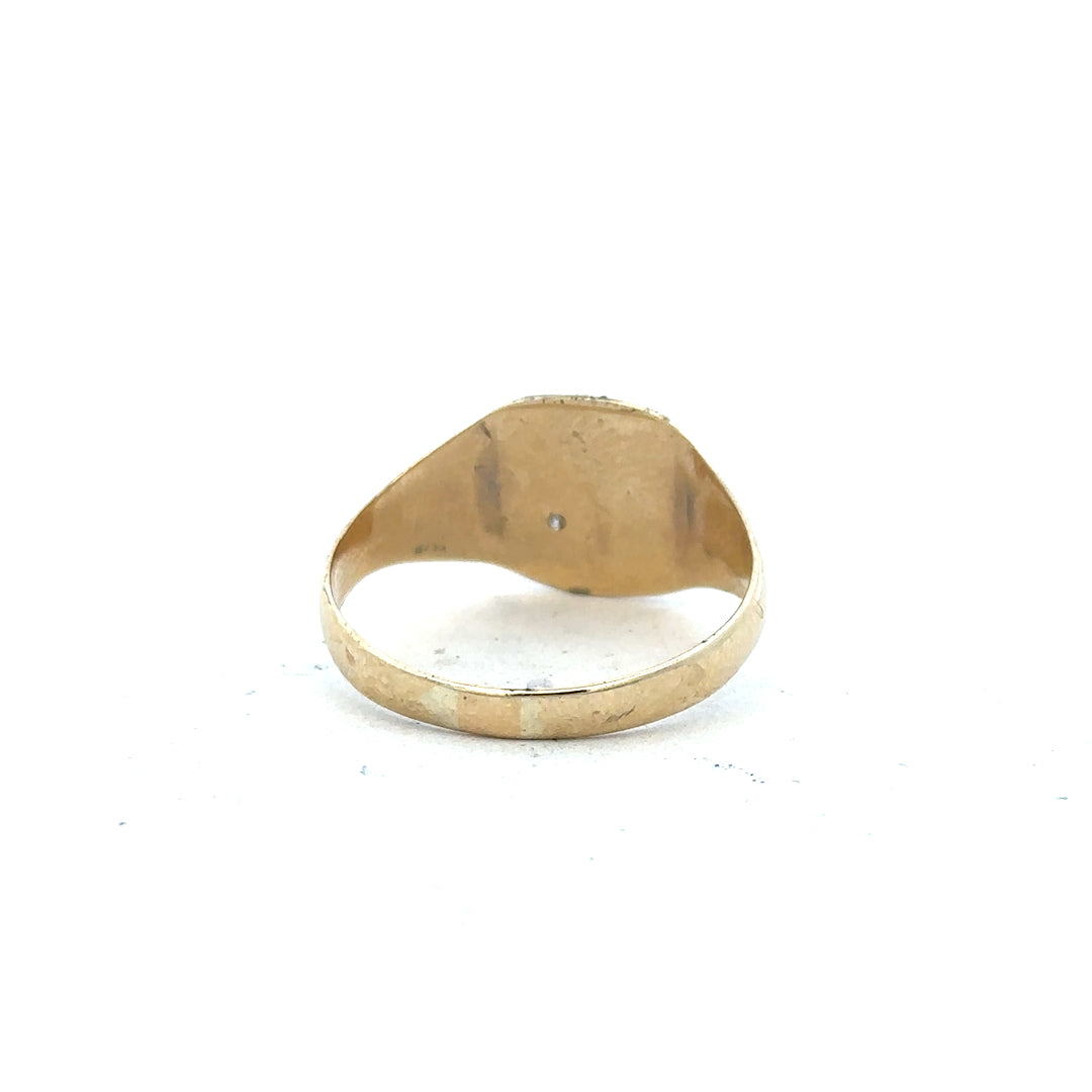 9ct yellow gold diamond signet ring in size Y, featuring a polished surface and embedded diamond detail.