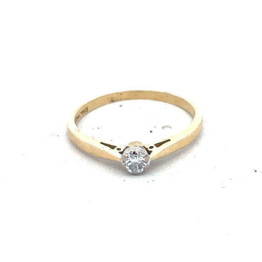 9ct yellow gold diamond solitaire ring featuring a central sparkling diamond and a smooth gold band.