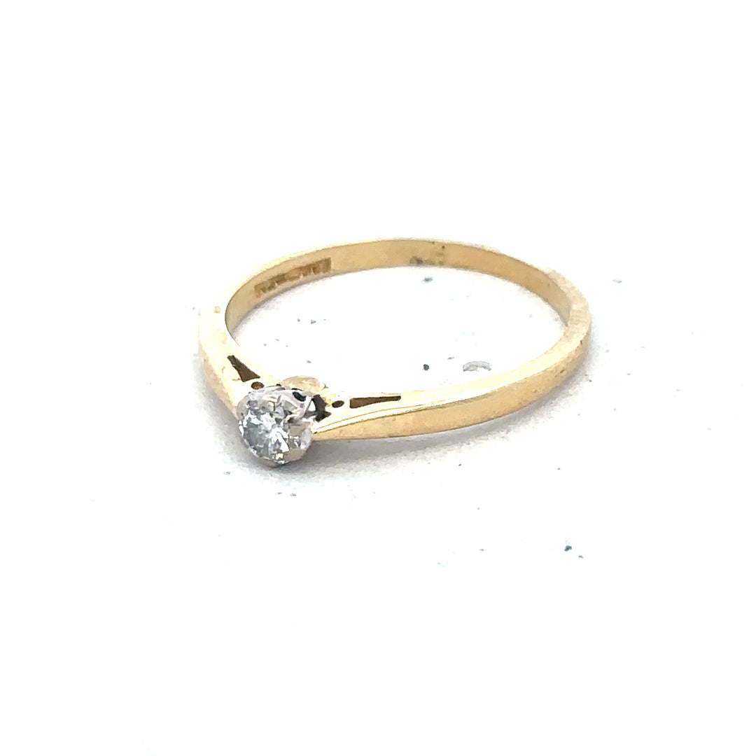 9ct yellow gold diamond solitaire ring with a single sparkling diamond and a smooth band, unbranded jewelry accessory.