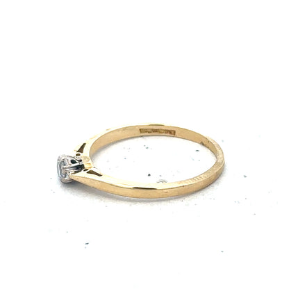 9ct yellow gold diamond solitaire ring with a central sparkling diamond and a sleek band, unbranded jewelry for elegant style.