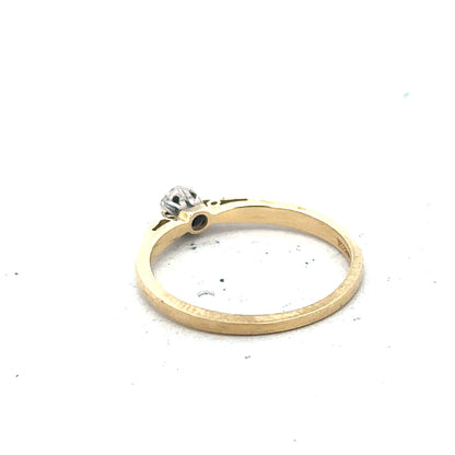 9ct yellow gold diamond solitaire ring with a single sparkling diamond set in a simple, elegant band.