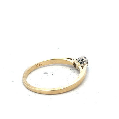 9ct yellow gold diamond solitaire ring featuring a central sparkling diamond on a sleek gold band.
