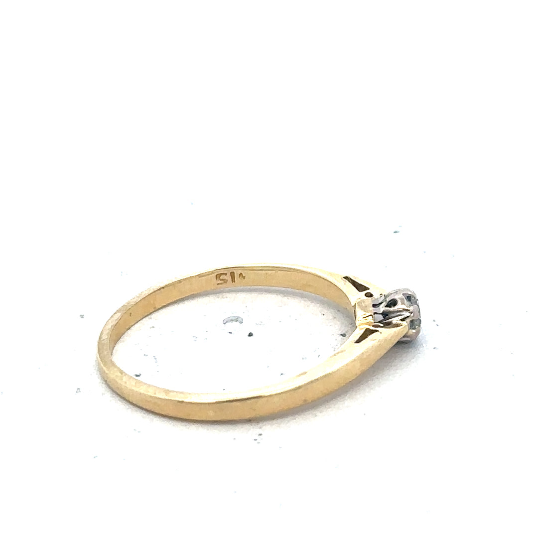 9ct yellow gold diamond solitaire ring featuring a central sparkling diamond and a sleek band design.