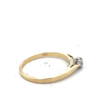 9ct yellow gold diamond solitaire ring featuring a central sparkling diamond and a sleek band design.