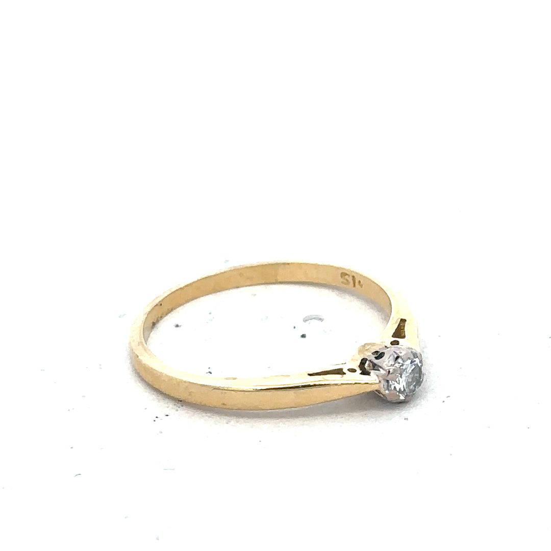9ct yellow gold diamond solitaire ring with a single sparkling diamond set in a sleek band.