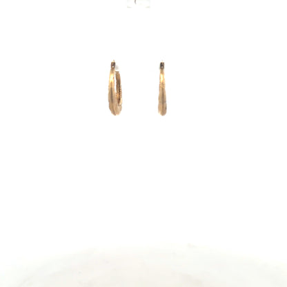 9ct yellow gold earrings weighing 0.8g, featuring a simple and elegant design, crafted from unbranded yellow gold.