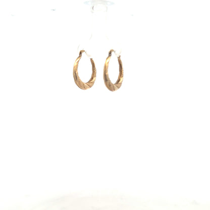 9ct yellow gold earrings weighing 0.8g, crafted with simple and elegant design, suitable for everyday wear.