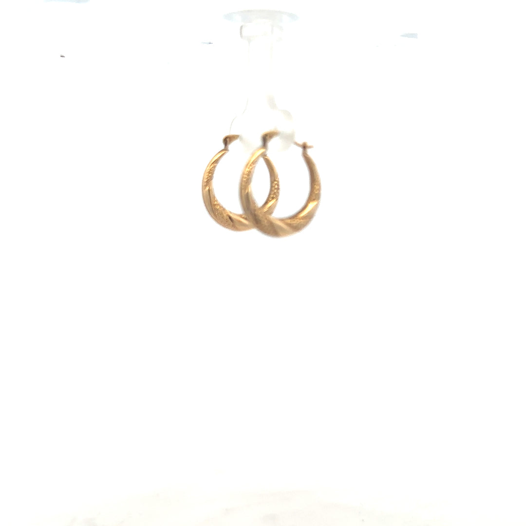 9ct yellow gold earrings weighing 0.8g with a classic design, displayed on a plain background.