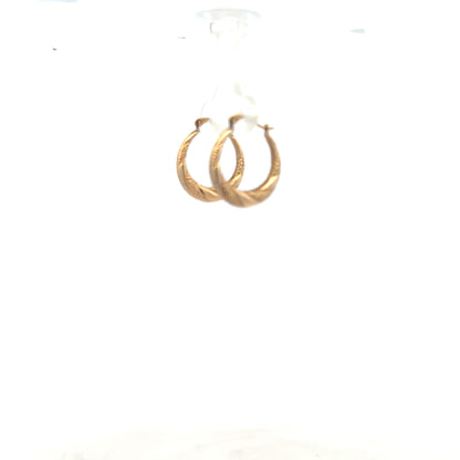 9ct yellow gold earrings weighing 0.8g with a classic design, displayed on a plain background.