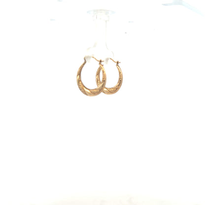 9ct yellow gold earrings weighing 0.8g, featuring simple and elegant design, perfect for everyday wear.