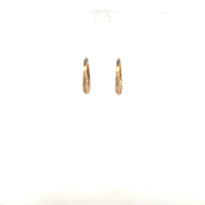 9ct yellow gold earrings with a delicate design, weighing 0.8g, showcased on a plain background.