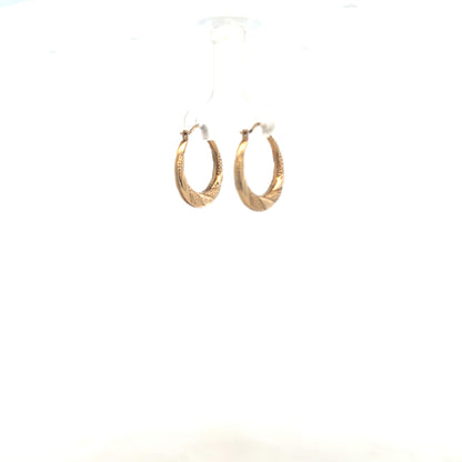 9ct yellow gold earrings weighing 0.8g, stylish jewelry with a classic design, perfect for everyday wear or special occasions.
