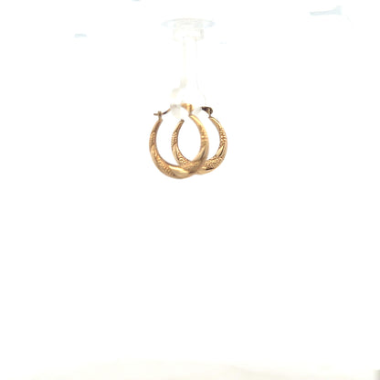 9ct yellow gold earrings weighing 0.8g, featuring a classic design, displayed on a plain background