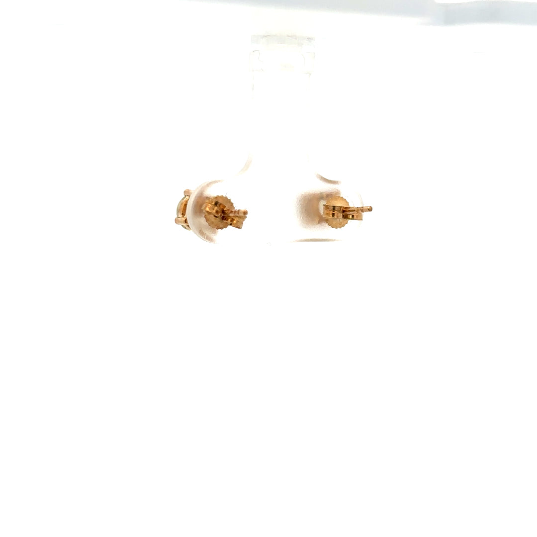 9ct yellow gold earrings weighing 1.2g, featuring a simple and elegant design, shown in a close-up image.