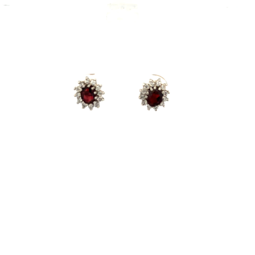 9ct yellow gold earrings weighing 1.2g, unbranded, with a simple and elegant design, shown in a close-up image.