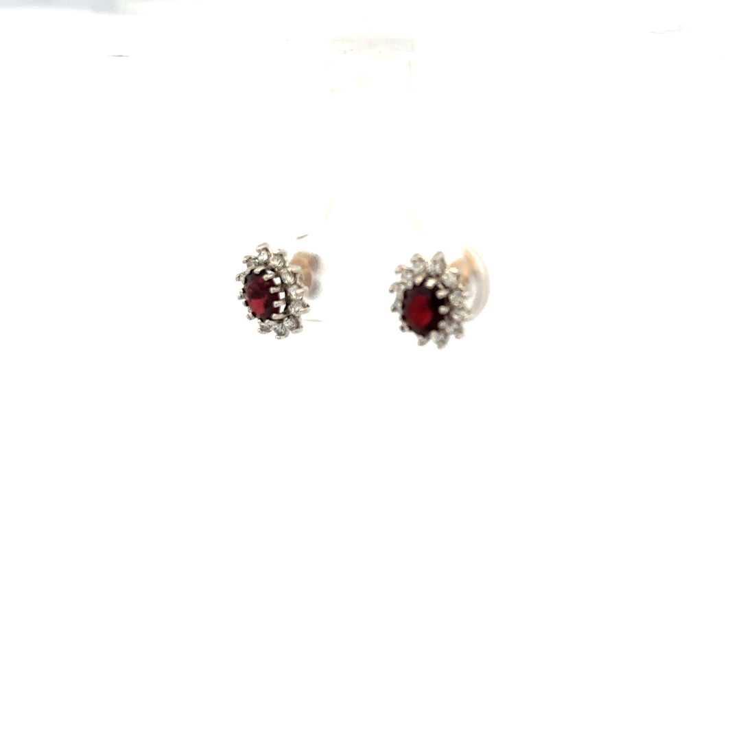 9ct yellow gold earrings weighing 1.2g, unbranded, with a simple, elegant design, displayed on a white background.