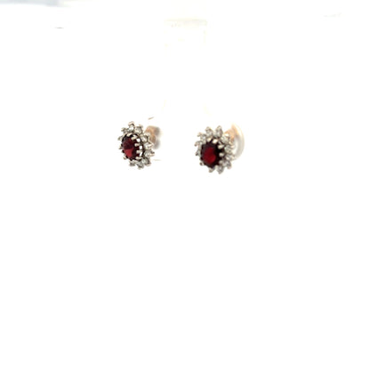 9ct yellow gold earrings weighing 1.2g, unbranded, with a simple, elegant design, displayed on a white background.
