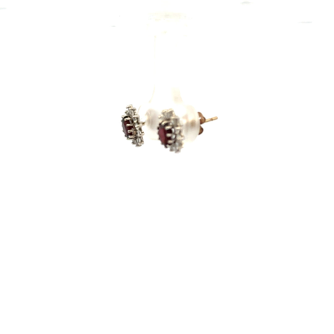 9ct yellow gold earrings weighing 1.2g, unbranded, with a simple and elegant design, shown in a close-up image.