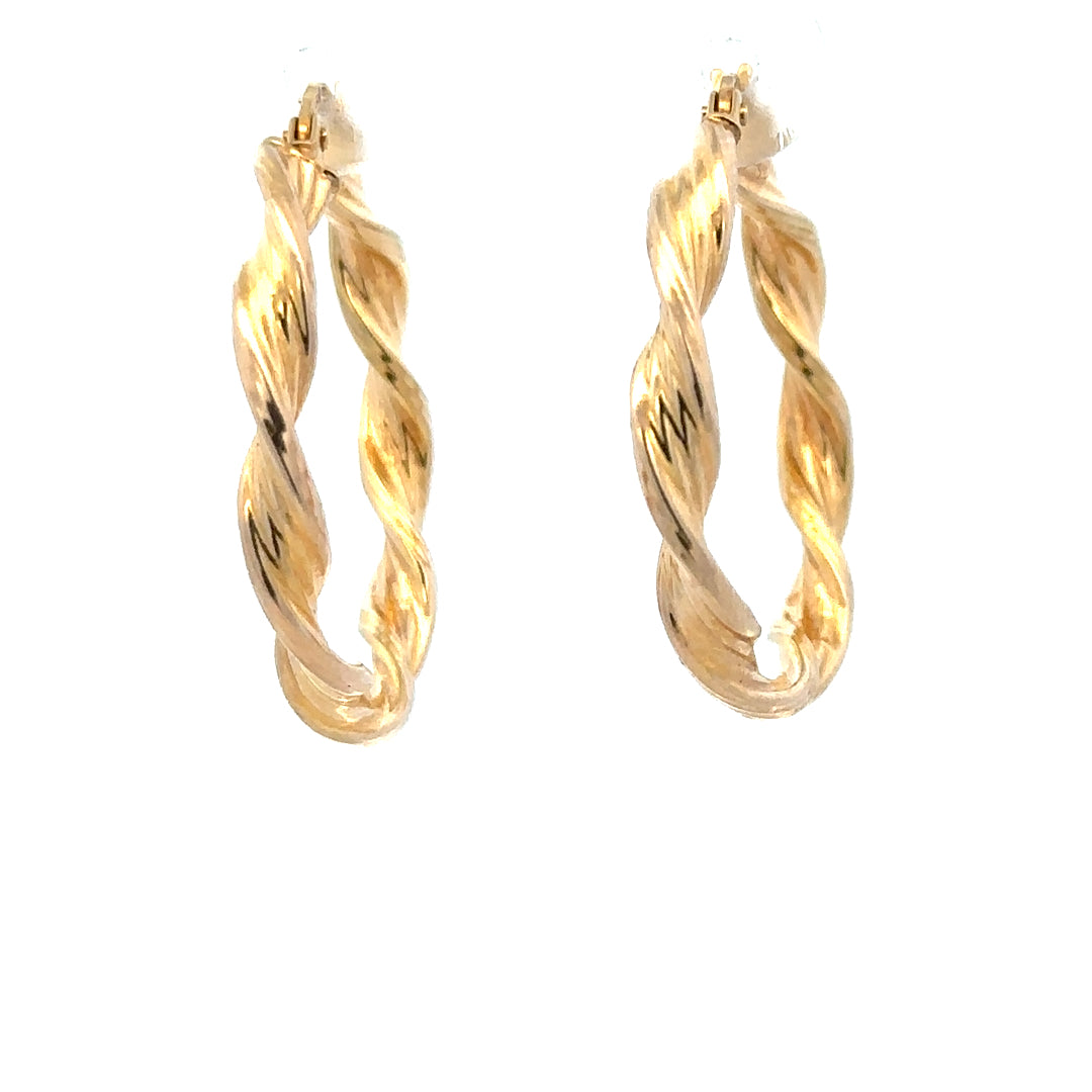 9ct yellow gold earrings weighing 1.6g, featuring a simple and elegant design, displayed on a plain background.