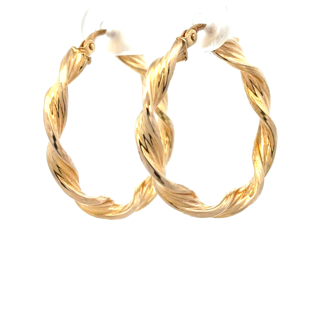 9ct yellow gold earrings weighing 1.6g, unbranded, featuring a classic design with polished finish, displayed against a neutral background.