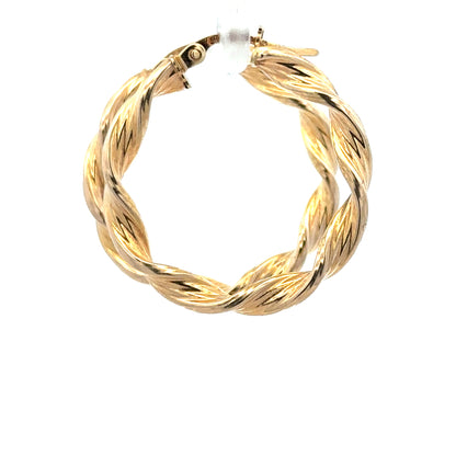 9ct yellow gold earrings weighing 1.6g, unbranded, showcasing classic design with polished finish and secure clasp.