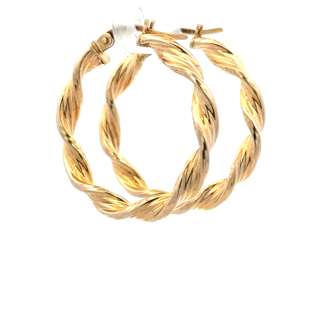 9ct yellow gold earrings with a delicate design, weighing 1.6g, featuring classic hoop style for elegant everyday wear.