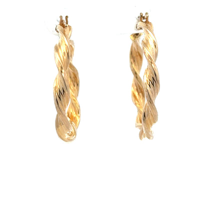 9ct yellow gold earrings weighing 1.6g, simple and elegant jewelry accessory, unbranded, shown on a neutral background.