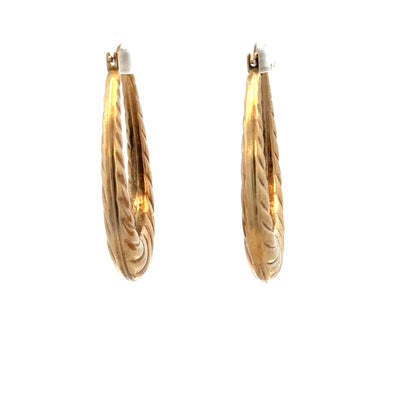 9ct yellow gold earrings weighing 1.6g, featuring a classic design with a polished finish, displayed on a white background.