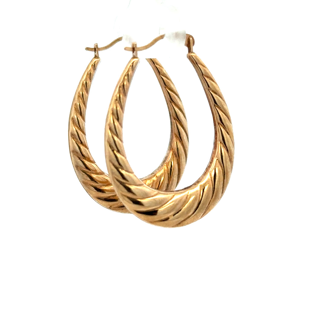 9ct yellow gold earrings weighing 1.6g, classic design, unbranded jewelry piece, shown from a front view with detailed craftsmanship