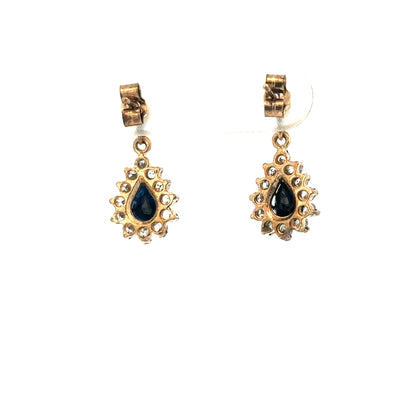 9ct yellow gold earrings weighing 1.8g, featuring a simple and elegant design, shown in a close-up image.