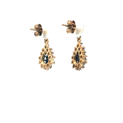 9ct yellow gold earrings weighing 1.8g, featuring a simple and elegant design, displayed against a neutral background.