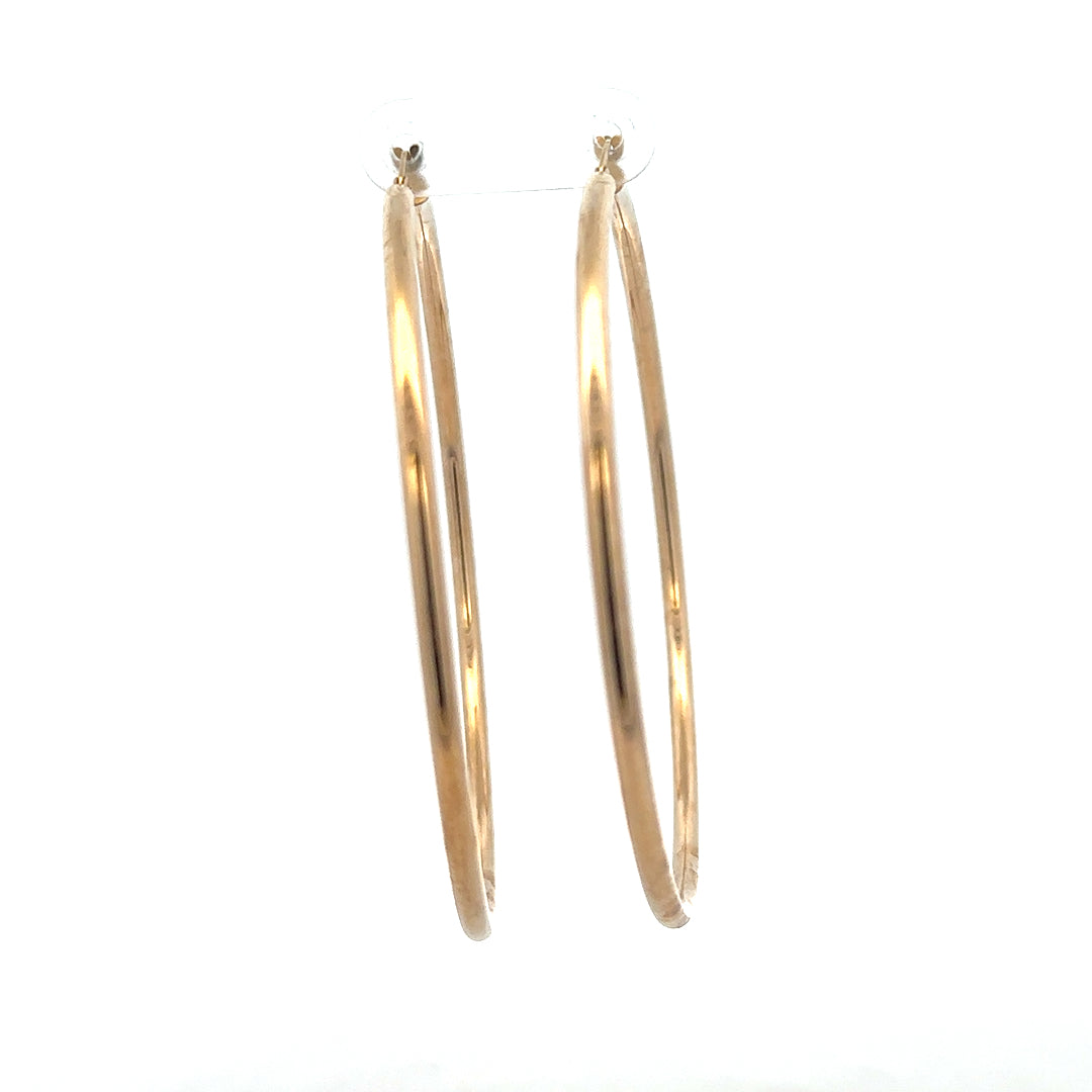 9ct yellow gold earrings weighing 3.4g, featuring a classic design, displayed against a neutral background.
