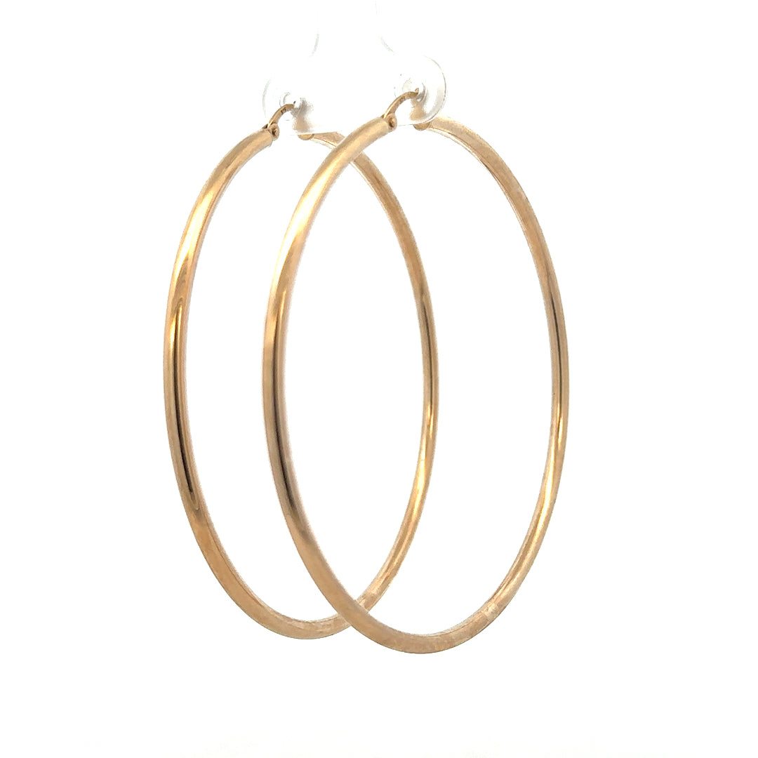 9ct yellow gold earrings weighing 3.4g, featuring a classic design, shown in a close-up view.