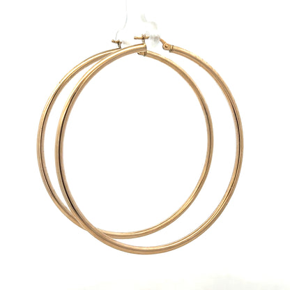 9ct yellow gold earrings weighing 3.4g, featuring a classic design, displayed against a neutral background.