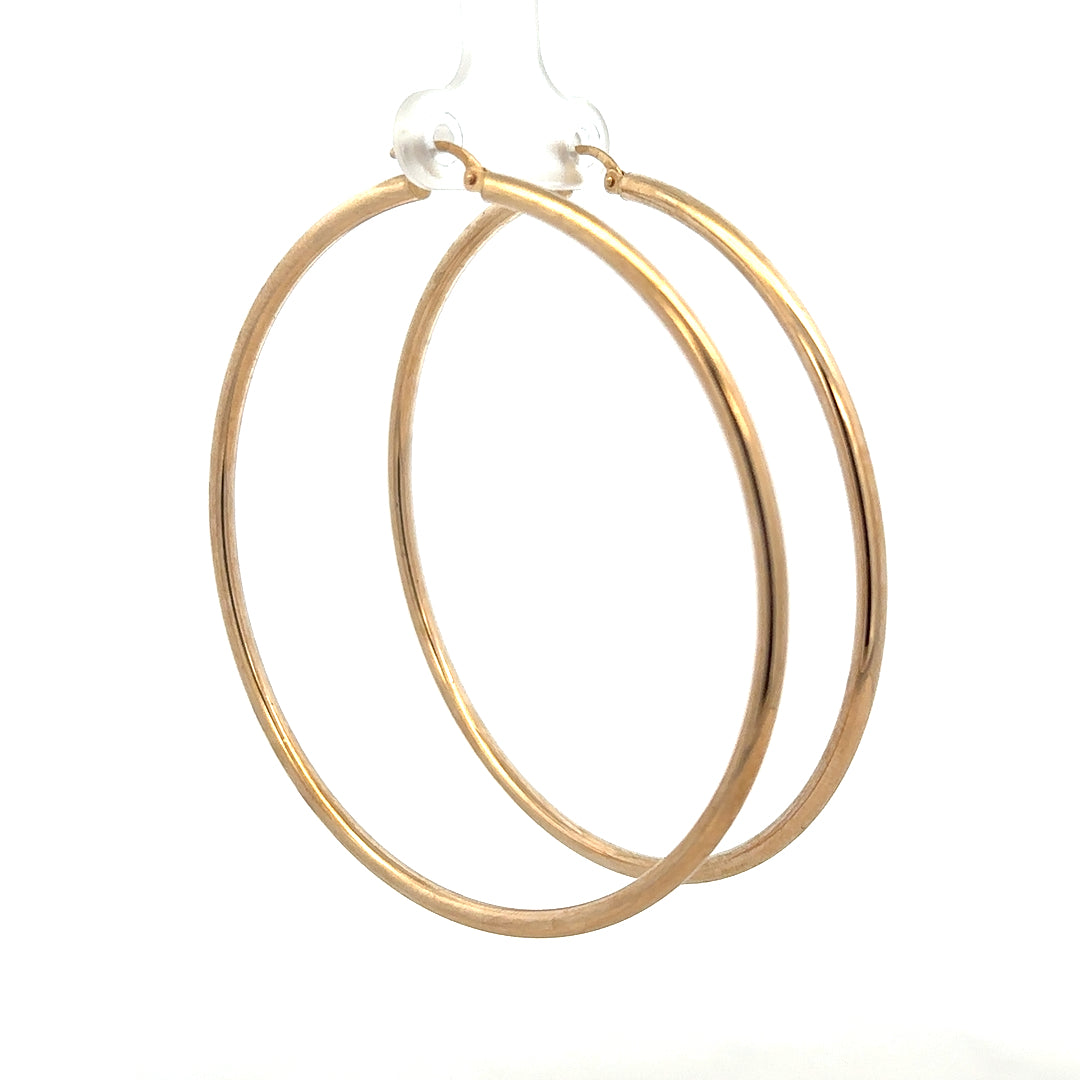 9ct yellow gold earrings weighing 3.4g, featuring a simple elegant design, unbranded jewelry for everyday wear.