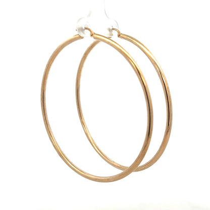 9ct yellow gold earrings weighing 3.4g, featuring a simple elegant design, unbranded jewelry for everyday wear.
