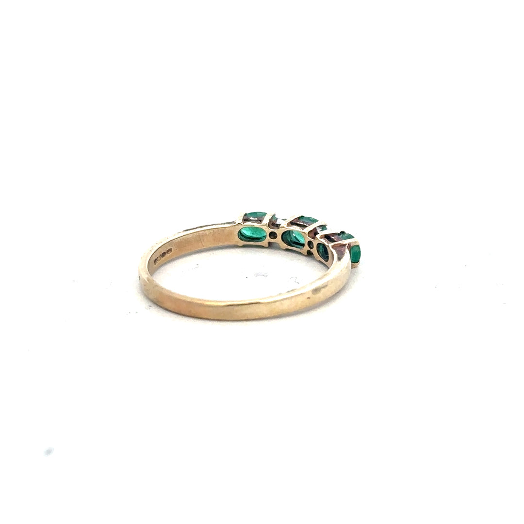 9ct yellow gold ring with emerald and diamond accents, size T, featuring a delicate design and sparkling gemstones.