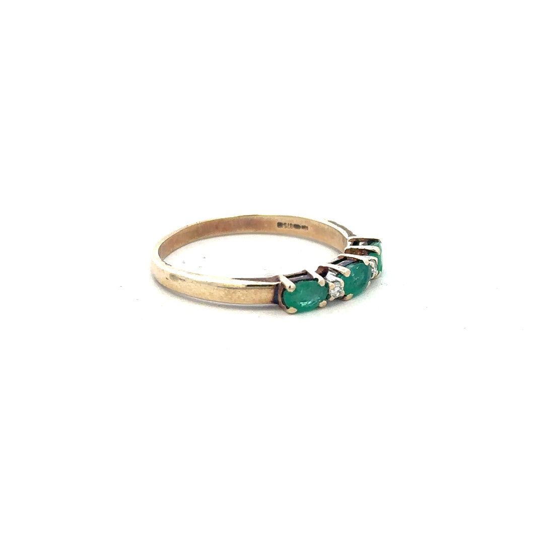 9ct yellow gold ring with emerald and diamond accents, size T, featuring intricate design and sparkling gemstones.