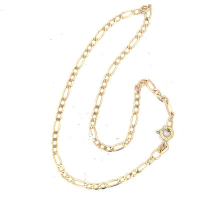 9ct yellow gold Figaro bracelet weighing 1.5g, unbranded, with a classic chain link design, shown in a detailed close-up image.
