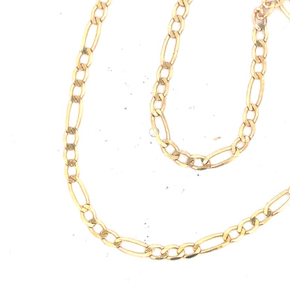 9ct yellow gold figaro bracelet weighing 1.5g, unbranded, with polished links showcasing elegant gold jewelry design