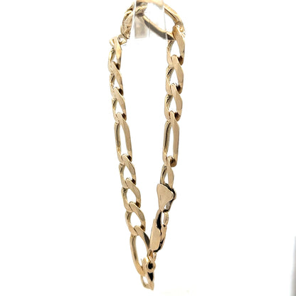 9ct yellow gold figaro bracelet weighing 20.1g, featuring linked chain design, unbranded jewelry accessory.