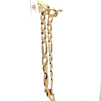 9ct yellow gold figaro bracelet, unbranded, featuring a classic chain design, weighing 20.1 grams, displayed on a neutral background.