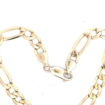 9ct yellow gold figaro bracelet weighing 9g, unbranded, with a classic chain design visible in the image.