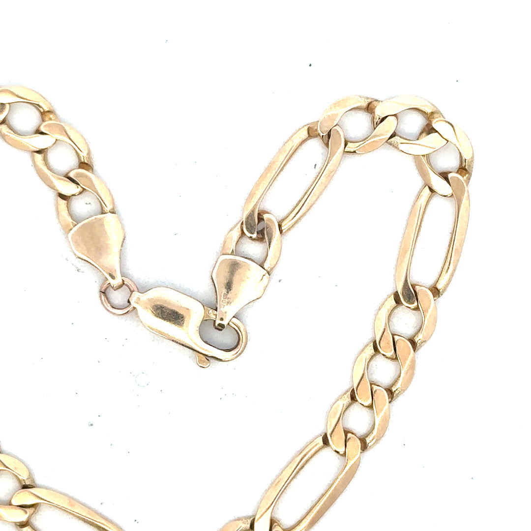 9ct yellow gold figaro bracelet weighing 9g, unbranded, with linked chain design visible in the image