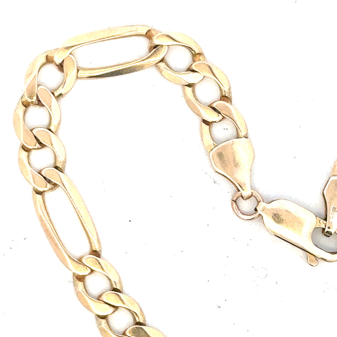 9ct yellow gold figaro bracelet weighing 9 grams, unbranded jewelry with linked chain design, shown in a close-up view.