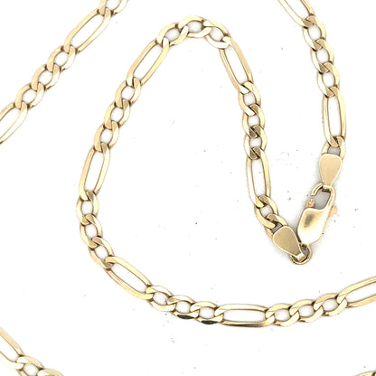 9ct yellow gold figaro chain, unbranded, weighing 11g, showcasing its linked design and polished finish.