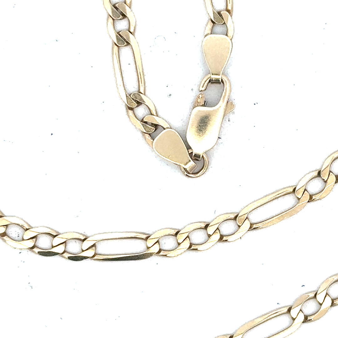 9ct yellow gold Figaro chain weighing 11g, unbranded jewelry with intricate links, shown in a close-up image.