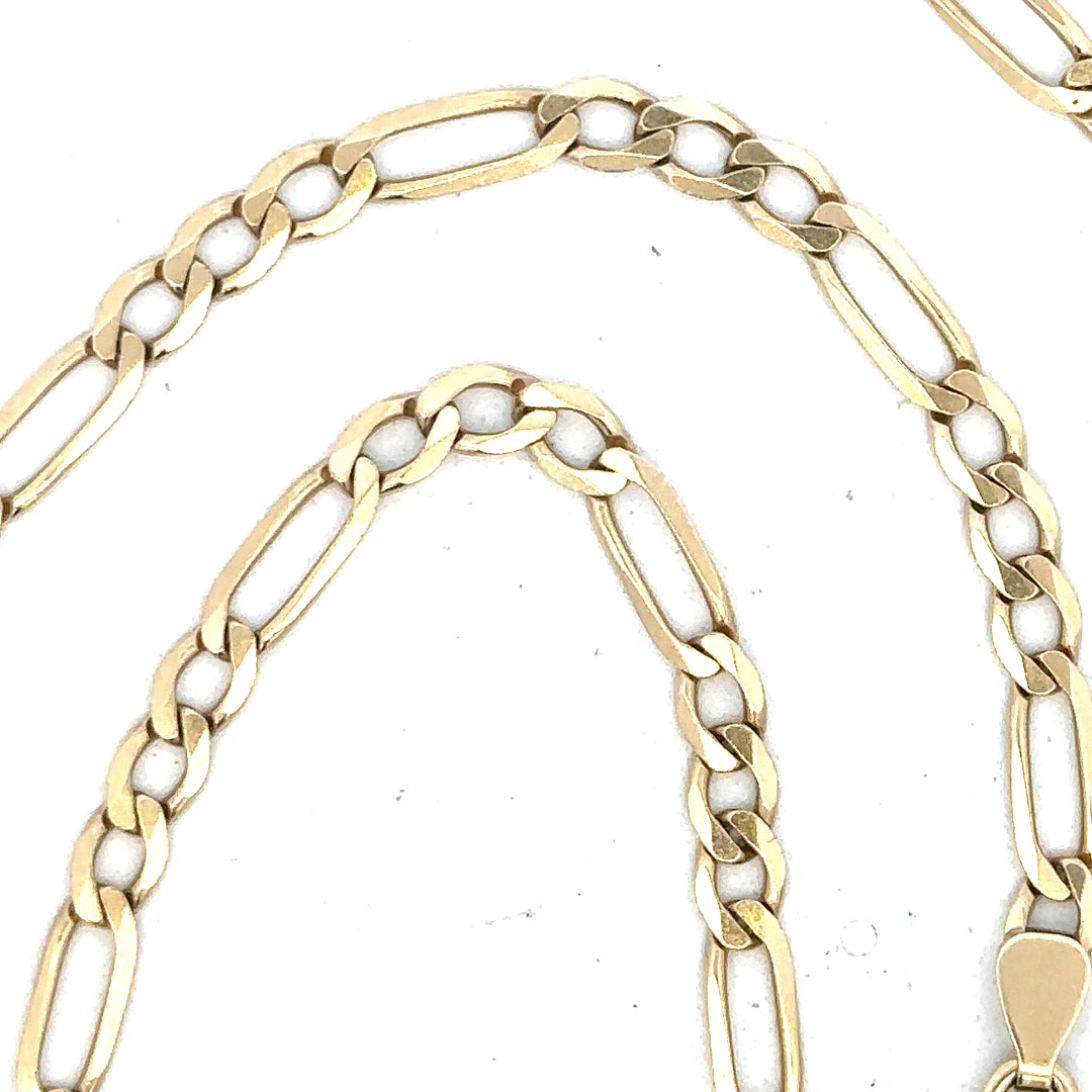 9ct yellow gold Figaro chain weighing 11g, showcasing its linked design and polished finish on a plain background.