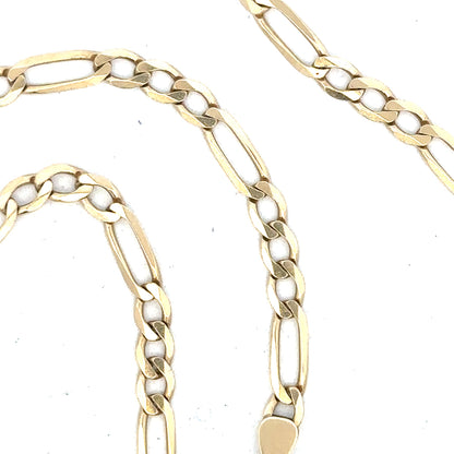 9ct yellow gold Figaro chain weighing 11g, unbranded, with intricate linked design and polished finish.