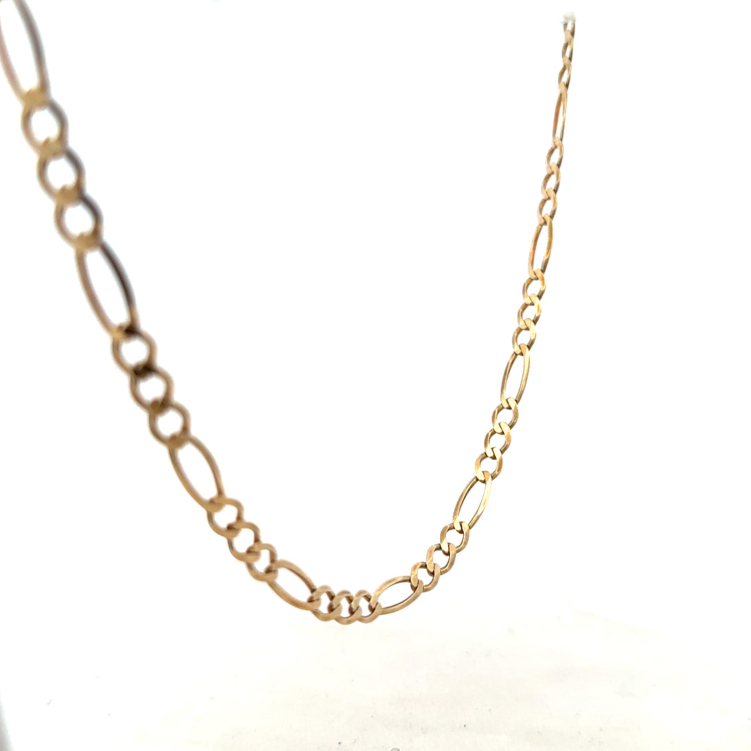 9ct yellow gold Figaro chain weighing 12.7g, showcasing its intricate links and shiny finish, unbranded jewelry.